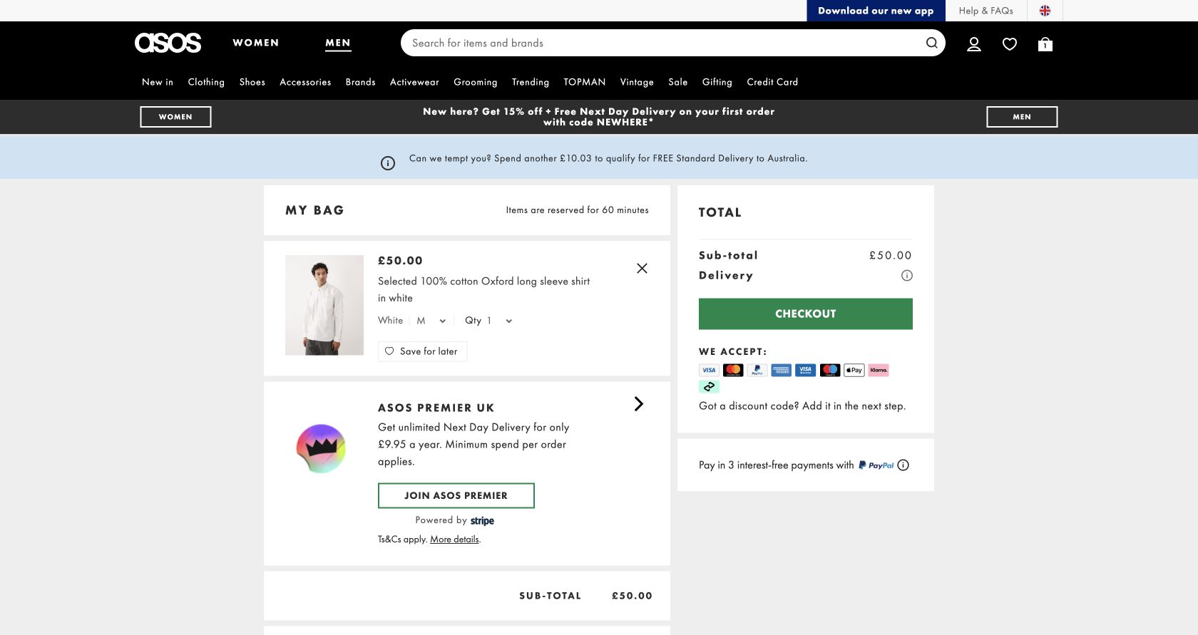 ASOS bag containing one white Oxford shirt in Medium with a £50 subtotal and delivery messaging