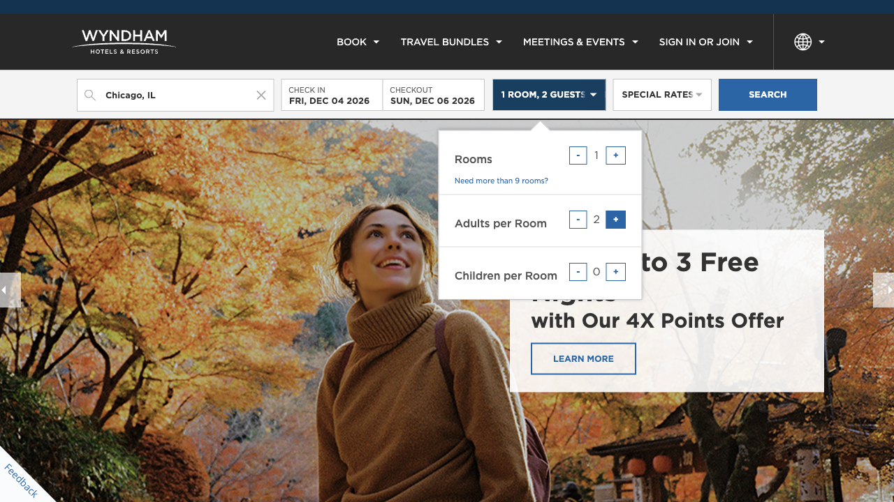 Wyndham's search filled in with Chicago, IL, Fri Dec 04 2026 to Sun Dec 06 2026, with the guest panel showing 1 room and 2 adults per room